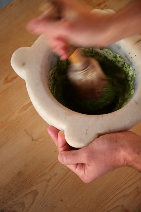 Pesto made by hand in a marble mortar, Daria Vinci adores pesto! Photo copyright Alison Harris